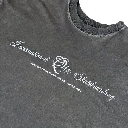CAMISETA QIX BOX INTERNACIONAL SKATEBOARDS PRETO ESTONADO
