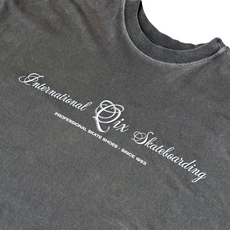 CAMISETA QIX BOX INTERNACIONAL SKATEBOARDS PRETO ESTONADO